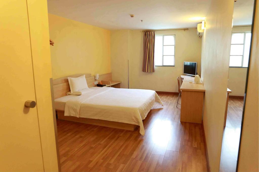 7Days Inn Bazhong Jiangbei Bus Station Centre Номер фото